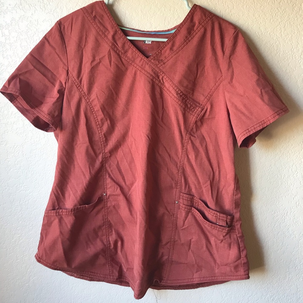 Orange scrub top